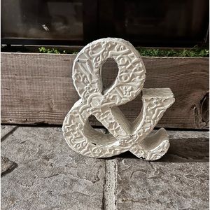 White & symbol used as book end or just decoration.